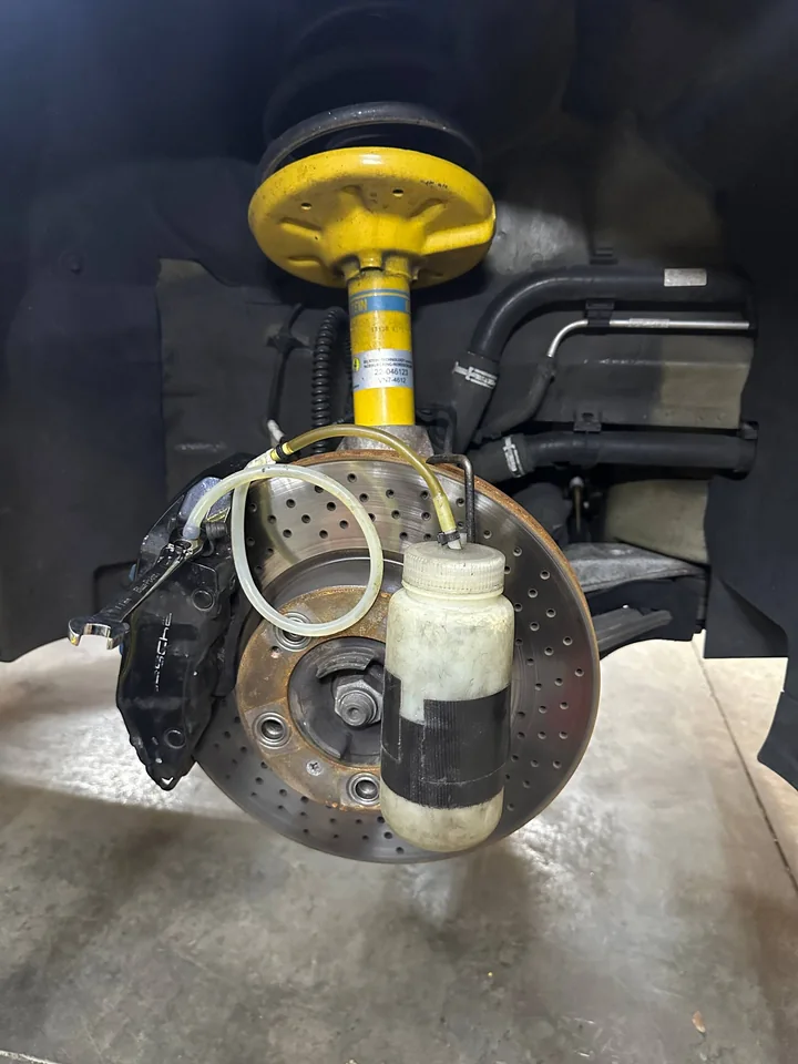 Exposed brake rotor, caliper and suspension